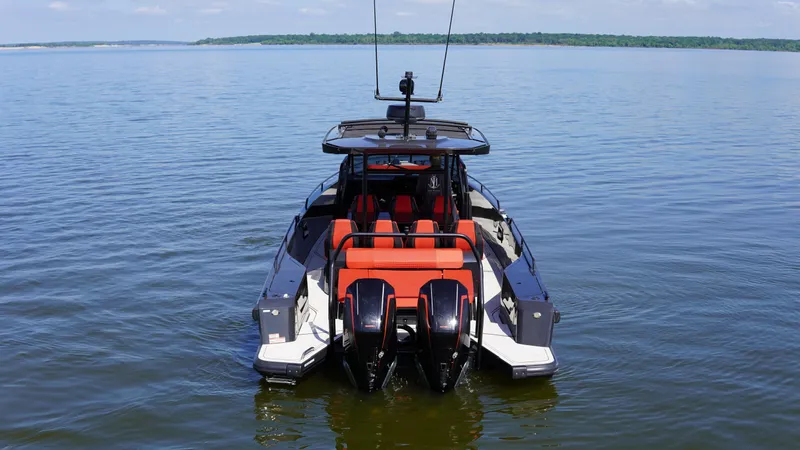 Slide: The Image of 2020 BRABUS Shadow 900 Sun Top boat on calm water, clear sky background. - 10