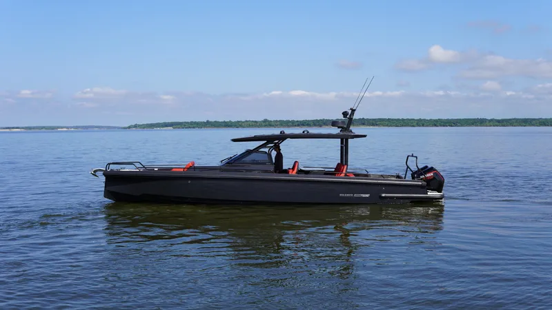 Slide: The Image of 2020 BRABUS Shadow 900 Sun Top boat on calm water under blue sky. - 15