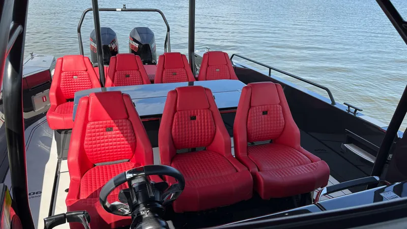 Slide: The Image of 2020 BRABUS Shadow 900 Sun Top with red seats, steering wheel, and twin engines on water. - 22