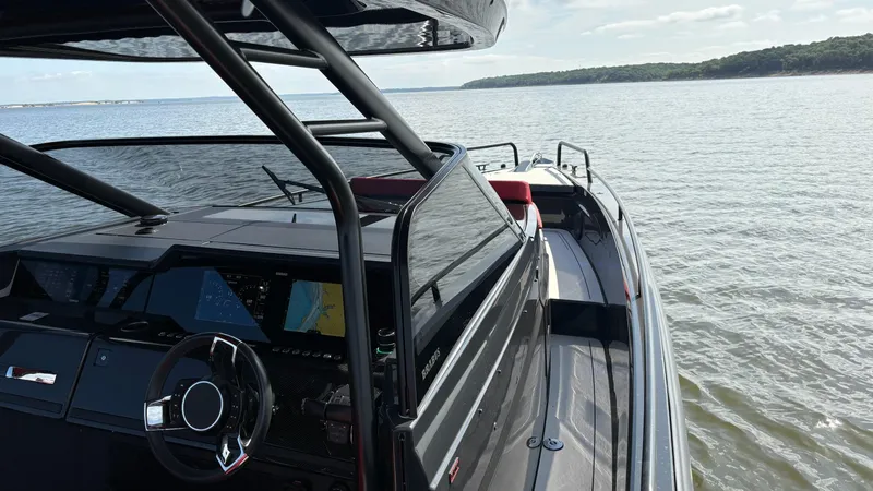 Slide: The Image of BRABUS Shadow 900 Sun Top 2020 yacht on calm waters, featuring sleek design and advanced navigation. - 27