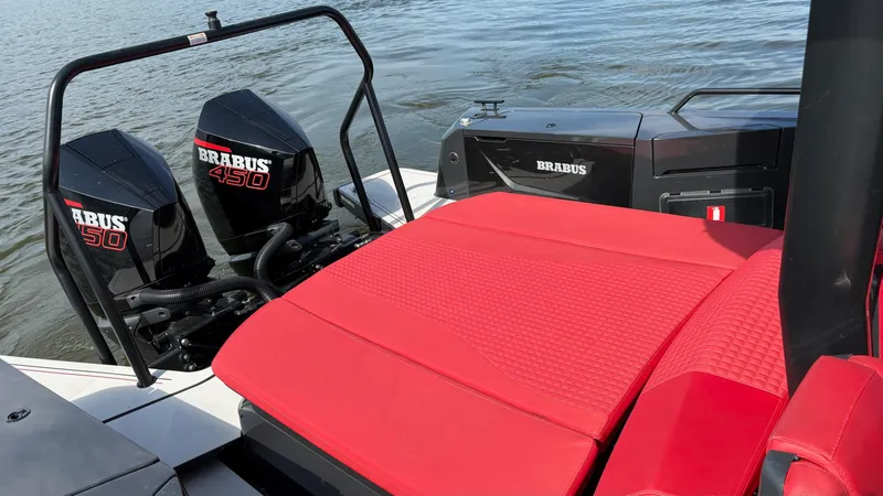 Slide: The Image of 2020 BRABUS Shadow 900 Sun Top with red seating and dual 450 engines on water. - 34