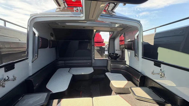 Slide: The Image of Interior of 2020 BRABUS Shadow 900 Sun Top luxury boat with seating and modern design. - 44