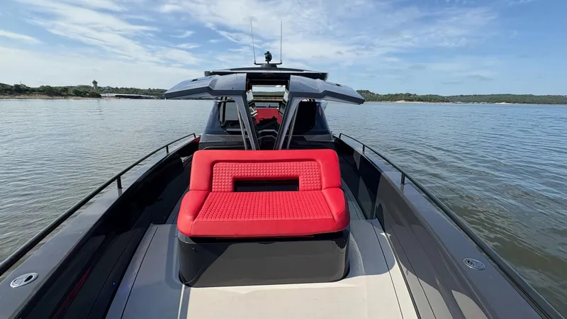 Slide: The Image of BRABUS Shadow 900 Sun Top 2020 on water, featuring sleek design and vibrant red seating. - 45