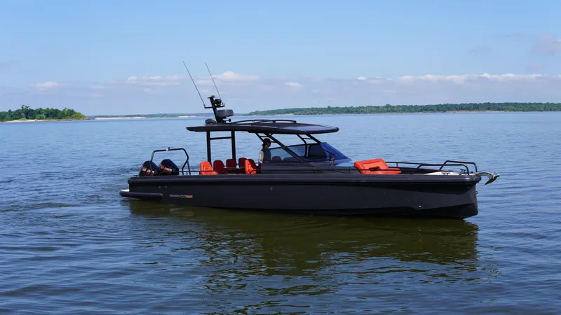 Slide: The Image of 2020 BRABUS Shadow 900 Sun Top boat cruising on a calm lake. - 8