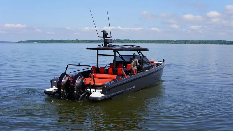 Slide: The Image of 2020 BRABUS Shadow 900 Sun Top boat cruising on a calm lake. - 9