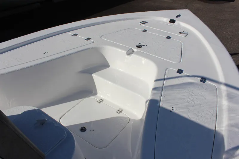 Slide: The Image of 2023 Sea Pro 208 Bay boat bow with storage compartments. - 12