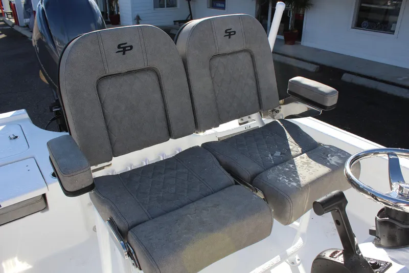 Slide: The Image of 2023 Sea Pro 208 Bay boat with dual gray cushioned seats. - 14