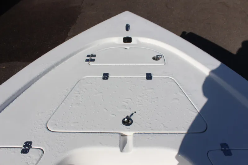 Slide: The Image of 2023 Sea Pro 208 Bay boat deck with storage compartments. - 15