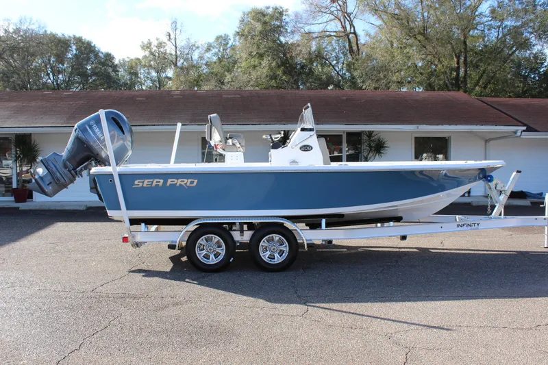 Slide: The Image of 2023 Sea Pro 208 Bay boat on a trailer, side view. - 6