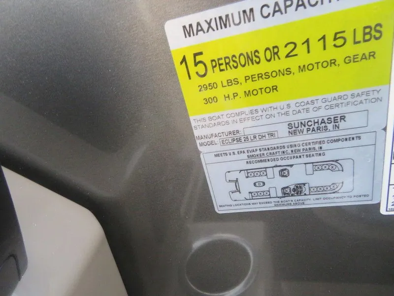 Slide: The Image of 2023 SunChaser Eclipse 25 LR DH capacity label, 15 persons or 2115 lbs, 300 HP motor. - 26