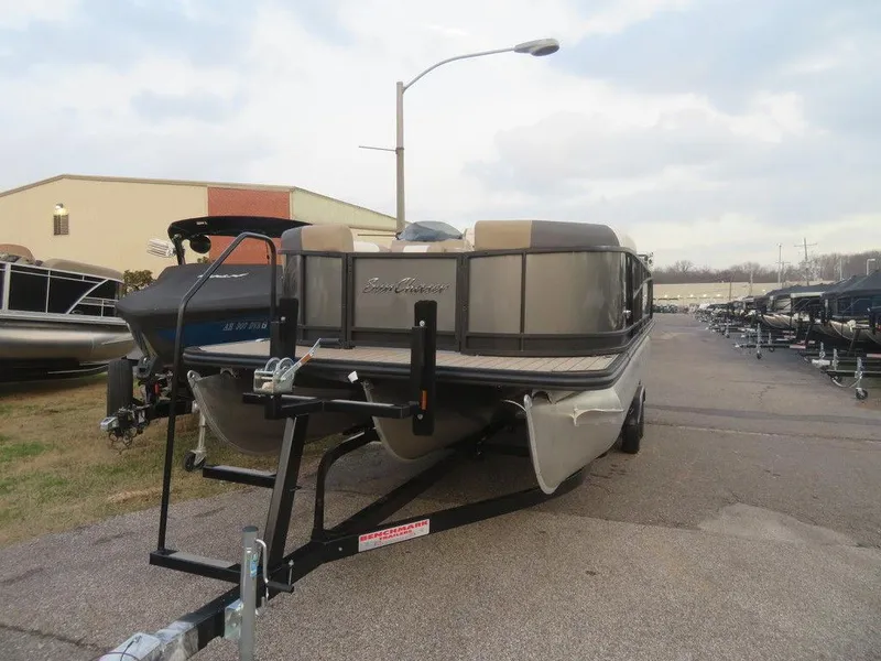 Slide: The Image of 2023 SunChaser Eclipse 25 LR DH pontoon boat on a trailer in a parking lot. - 6