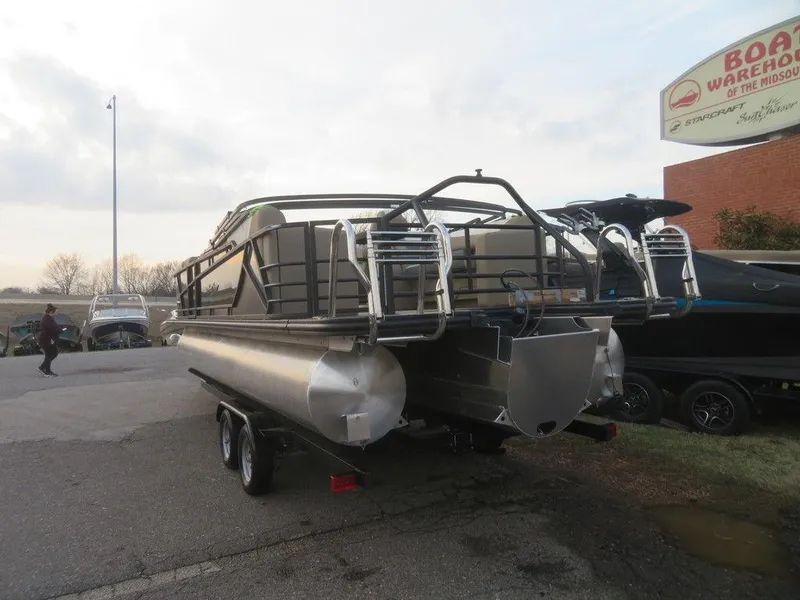 Slide: The Image of 2023 SunChaser Eclipse 25 LR DH pontoon boat on trailer at dealership. - 7