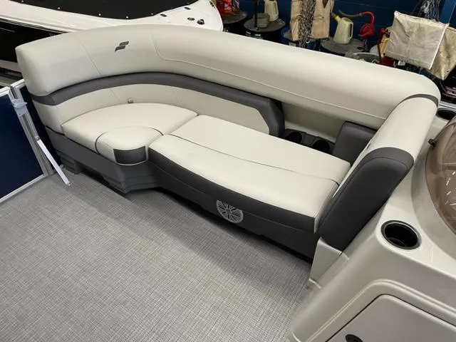 Slide: The Image of 2023 Starcraft EX 22 R boat interior with plush seating and modern design. - 15
