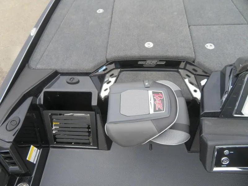 Slide: The Image of 2023 Ranger Z521R Ranger Cup Equipped boat interior, featuring seating and storage compartments. - 13