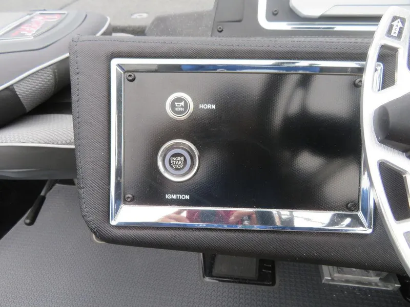 Slide: The Image of 2023 Ranger Z521R Ranger Cup Equipped dashboard with horn and ignition buttons. - 16