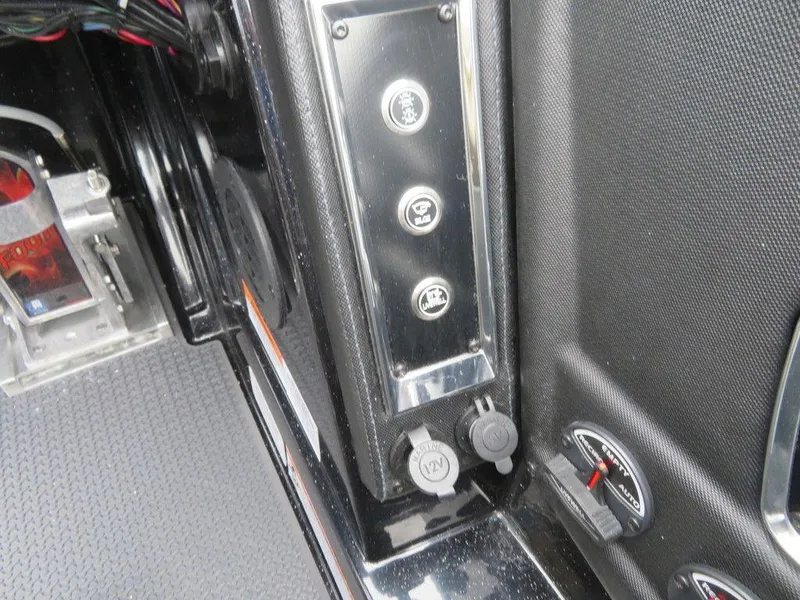 Slide: The Image of 2023 Ranger Z521R Ranger Cup Equipped control panel and switches. - 17