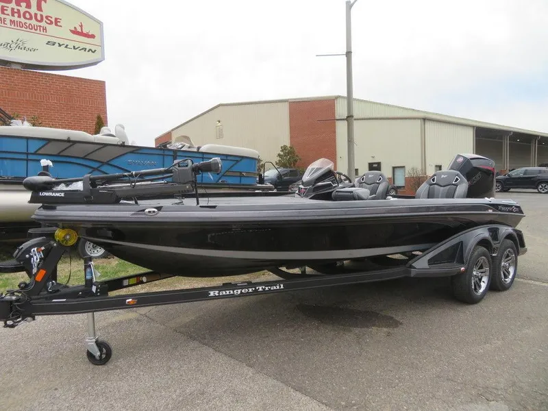 Slide: The Image of 2023 Ranger Z521R Ranger Cup Equipped boat on trailer in parking lot. - 3