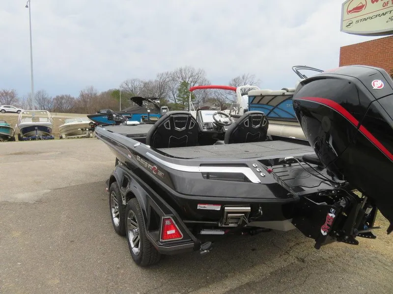 Slide: The Image of 2023 Ranger Z521R Ranger Cup Equipped boat in a parking lot. - 4