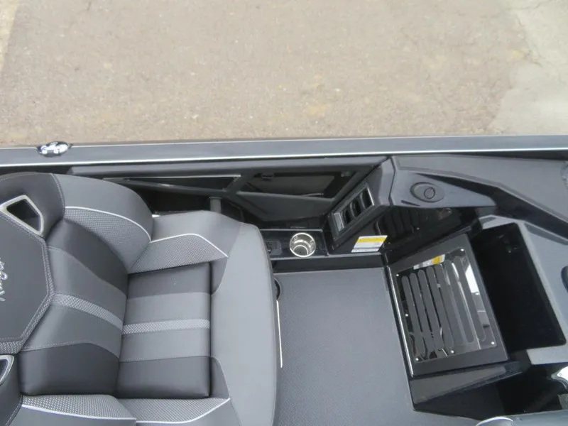Slide: The Image of 2023 Ranger Z521R Ranger Cup Equipped boat interior with black and gray seating. - 7