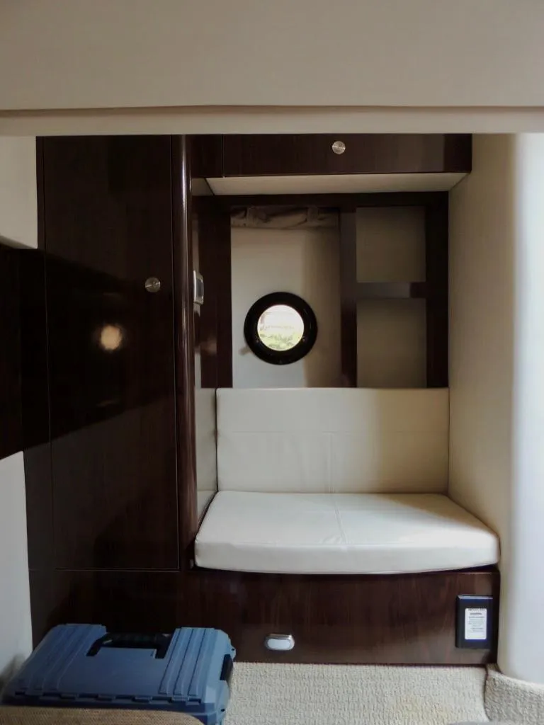 Slide: The Image of Interior cabin seating area of 2016 Sea Ray 350 Sundancer yacht. - 49
