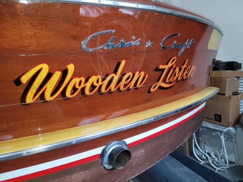 Slide: The Image of 1953 Chris-Craft HOLIDAY 24 wooden boat stern with Wooden Lister name. - 17