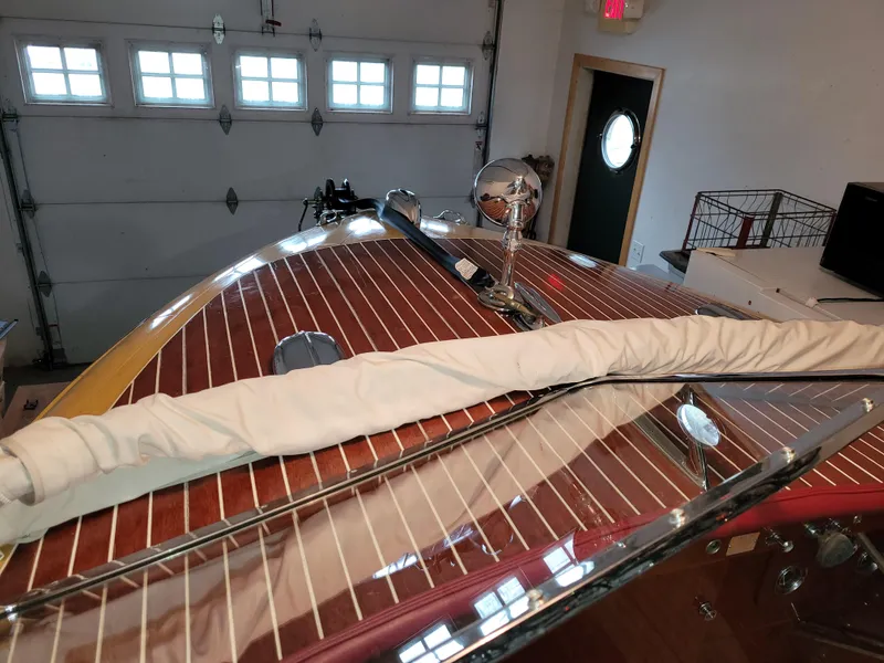 Slide: The Image of 1953 Chris-Craft HOLIDAY 24 classic wooden boat in a garage. - 19