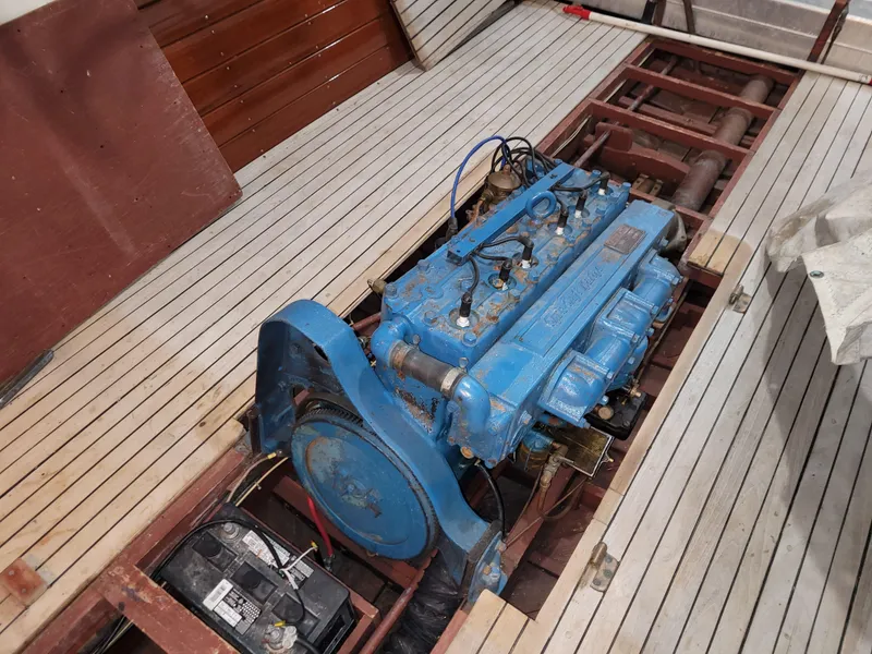 Slide: The Image of 1953 Chris-Craft HOLIDAY 24 boat engine in wooden deck restoration. - 28