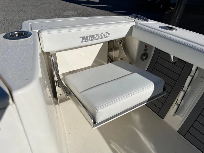 Slide: The Image of 2023 Pathfinder 2700 Open boat with foldable seat and cup holders. - 16