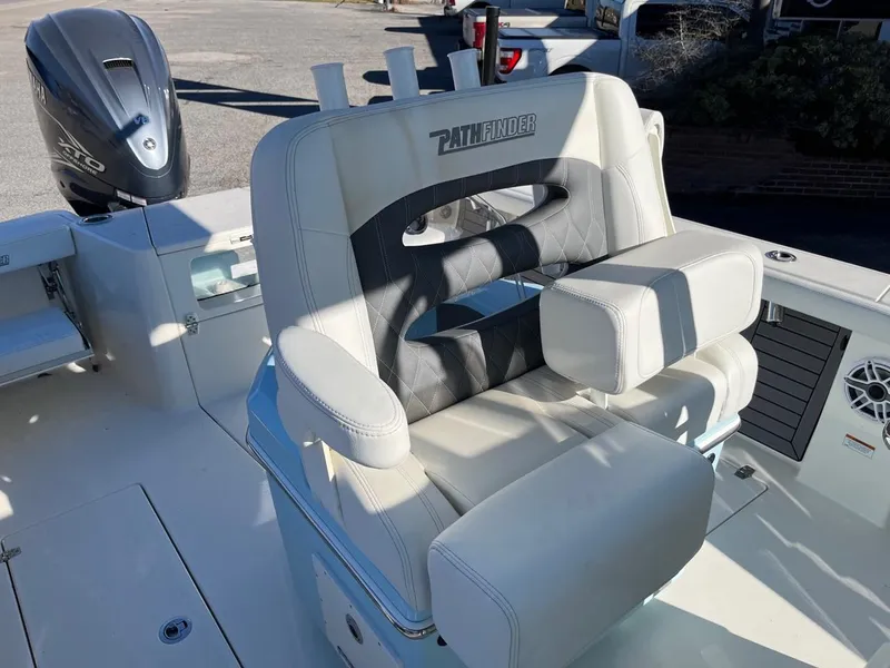 Slide: The Image of 2023 Pathfinder 2700 Open boat with cushioned seating and Yamaha outboard motor. - 17