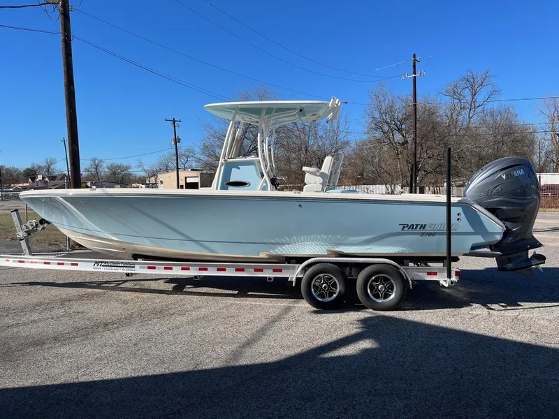 Slide: The Image of 2023 Pathfinder 2700 Open boat on a trailer in a parking lot. - 3
