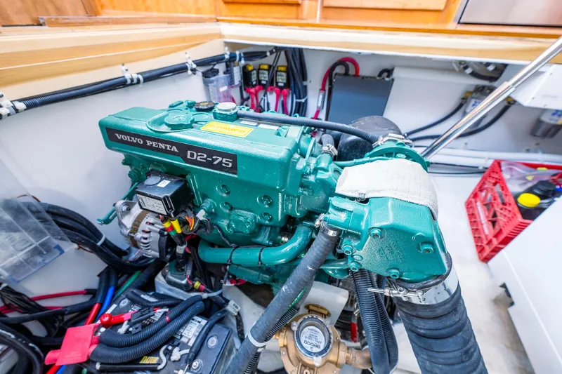 Slide: The Image of Volvo Penta D2-75 engine in a 2025 Tartan 455 sailboat engine compartment. - 24