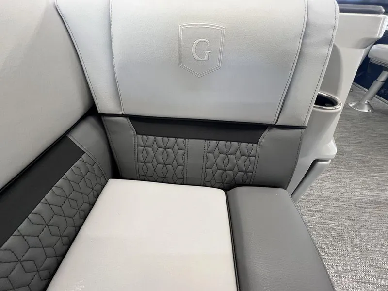 Slide: The Image of 2023 Godfrey SW 2286 MT boat seat with grey and black upholstery. - 6