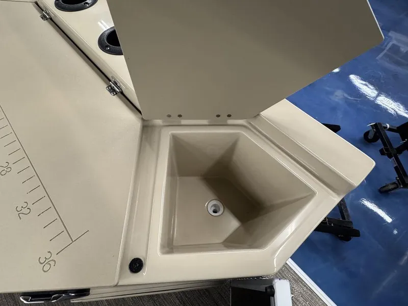 Slide: The Image of 2023 Godfrey SW 2286 FS boat sink and measuring board detail. - 15