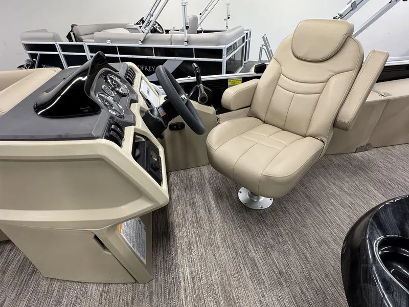 Slide: The Image of Captain's chair and dashboard of 2023 Godfrey SW 2286 FS boat. - 8