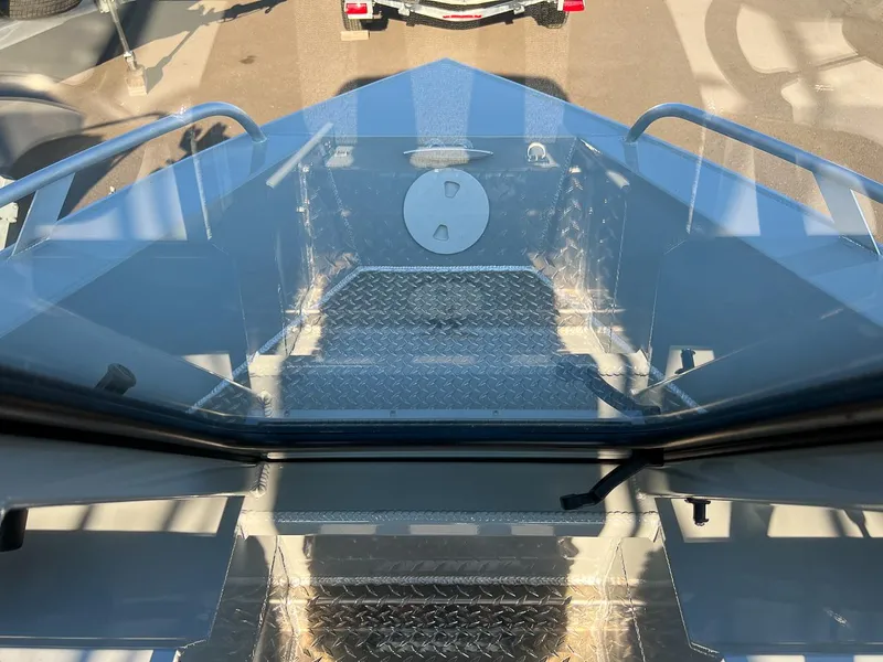 Slide: The Image of 2024 Hewescraft 200 Pro-V boat interior with diamond plate flooring. - 7
