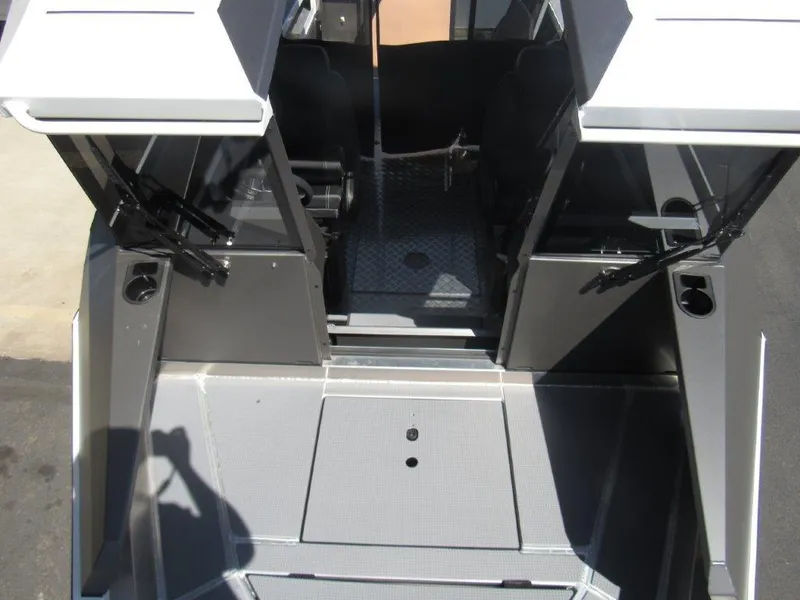 Slide: The Image of 2022 Stabicraft 2250 UltraCab WT boat interior, showing seating and deck area. - 18