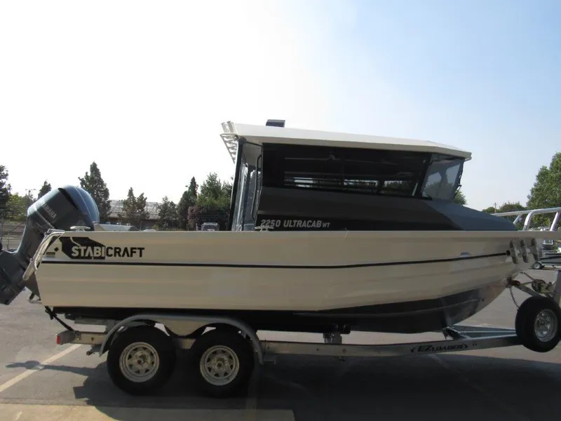 Slide: The Image of 2022 Stabicraft 2250 UltraCab WT boat on trailer, side view. - 6