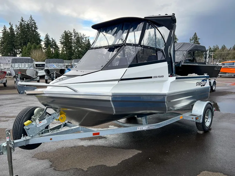 Slide: The Image of 2024 Stabicraft 1550 Fisher boat on trailer in a marina. - 6