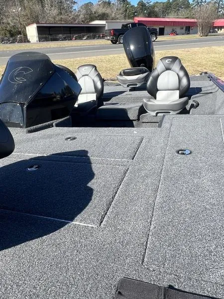 Slide: The Image of 2023 Crestliner XF 179 fishing boat with spacious deck and comfortable seating. - 5