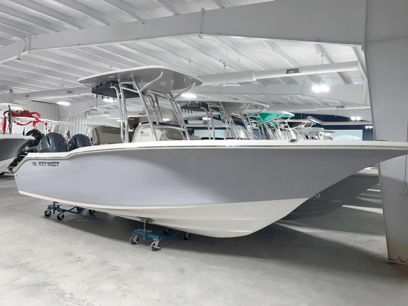 Slide: The Image of 2024 Key West 244 Center Console boat in showroom. - 0