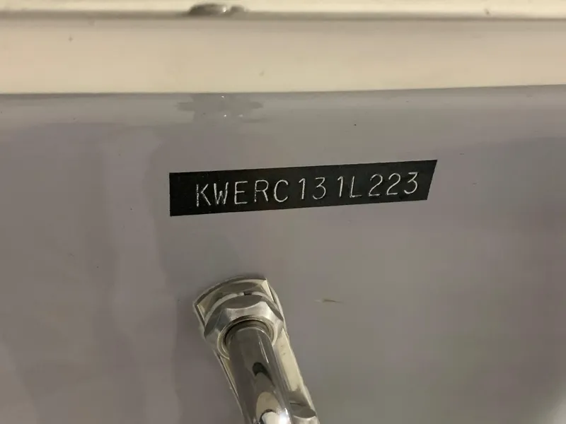 Slide: The Image of 2024 Key West 244 Center Console boat hull identification number (HIN) plate. - 18