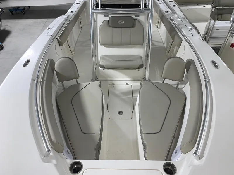 Slide: The Image of 2024 Key West 244 Center Console boat interior with cushioned seating. - 5