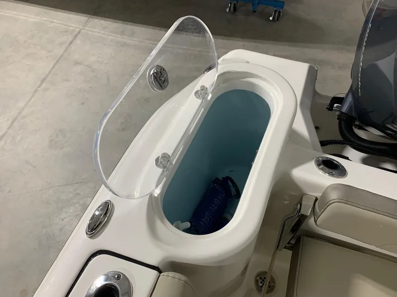 Slide: The Image of 2024 Key West 244 CC Manta Gray boat livewell with open lid. - 16
