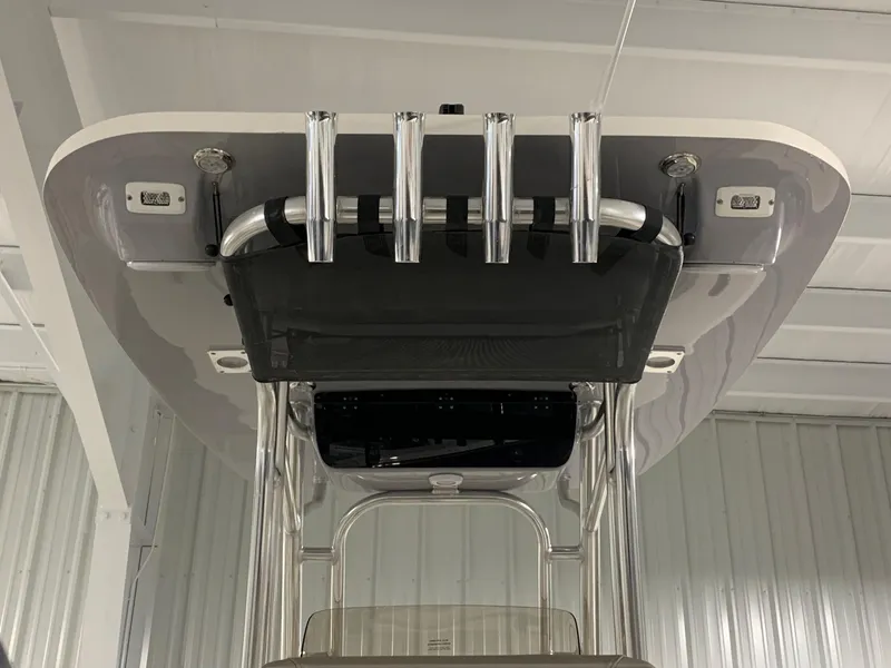 Slide: The Image of 2024 Key West 244 CC Manta Gray boat T-top with rod holders. - 17