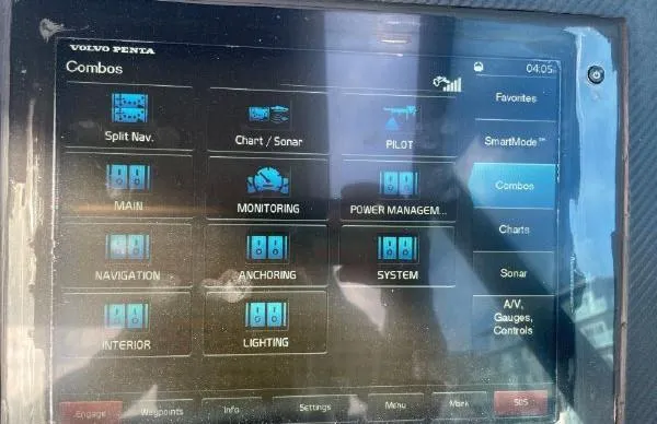 Slide: The Image of Evo Yachts 43 2017 control panel display showing navigation, monitoring, and system management options. - 13