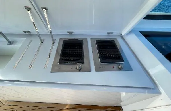 Slide: The Image of Outdoor grill station on 2017 Evo Yachts 43 model. - 14