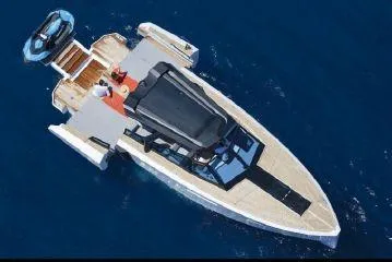 Slide: The Image of 2017 Evo Yachts 43 luxury motor yacht cruising on blue water. - 30