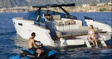 Slide: The Image of 2017 Evo Yachts 43 model with people enjoying water activities. - 32