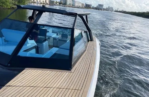 Slide: The Image of 2017 Evo Yachts 43 cruising on a scenic waterway. - 6