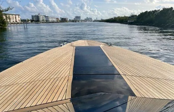 Slide: The Image of Bow view of 2017 Evo Yachts 43 on a calm waterway. - 7